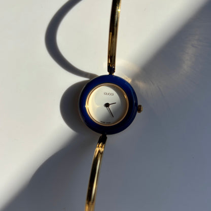 Gucci 1990s Interchangeable Bezel Gold Plated Bangle Watch with 12 bezels, case