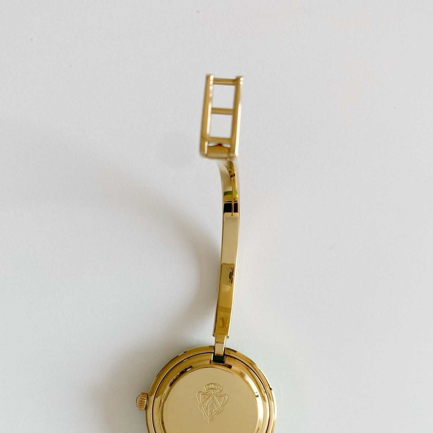 Gucci 1990s Interchangeable Bezel Gold Plated Bangle Watch with 12 bezels, case (Small)