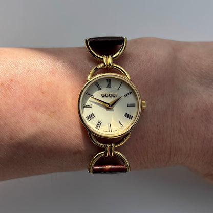 Gucci 1990s Round Dial Gold Plated Horsebit Watch