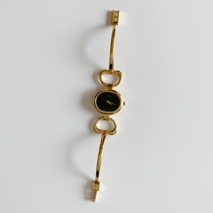 Gucci 1990s Black Dial Gold Plated Bangle Watch
