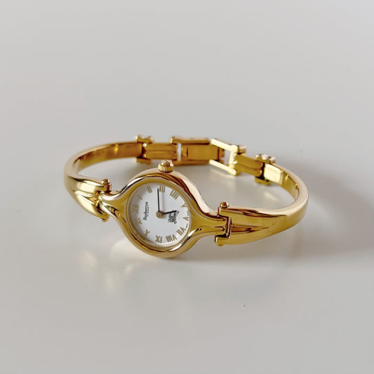 Burberry 1990s Round Dial Gold Plated Bangle Watch