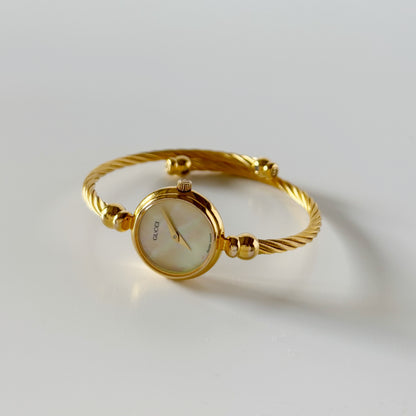Gucci 1990s Seashell Dial Gold Plated Cable Bangle Watch