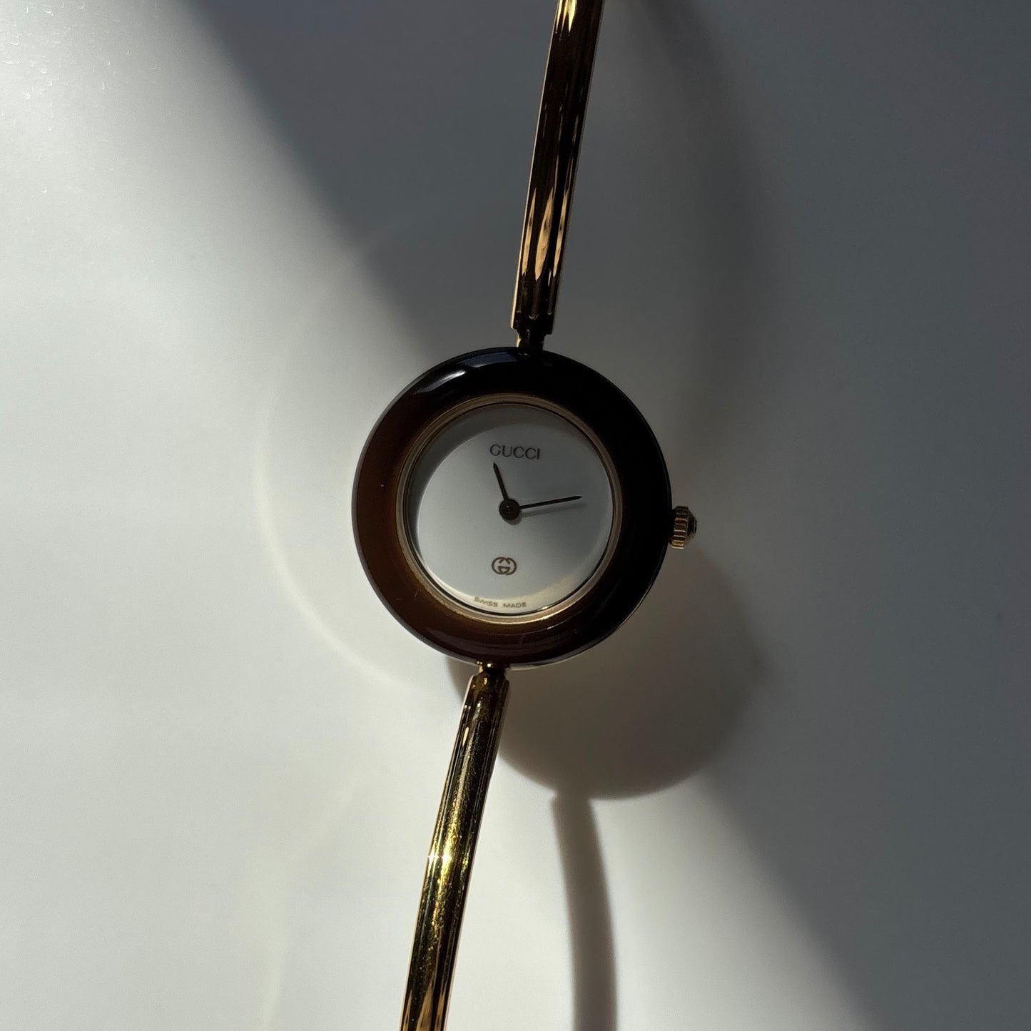Gucci 1990s Interchangeable Bezel Gold Plated Bangle Watch with 12 bezels, case