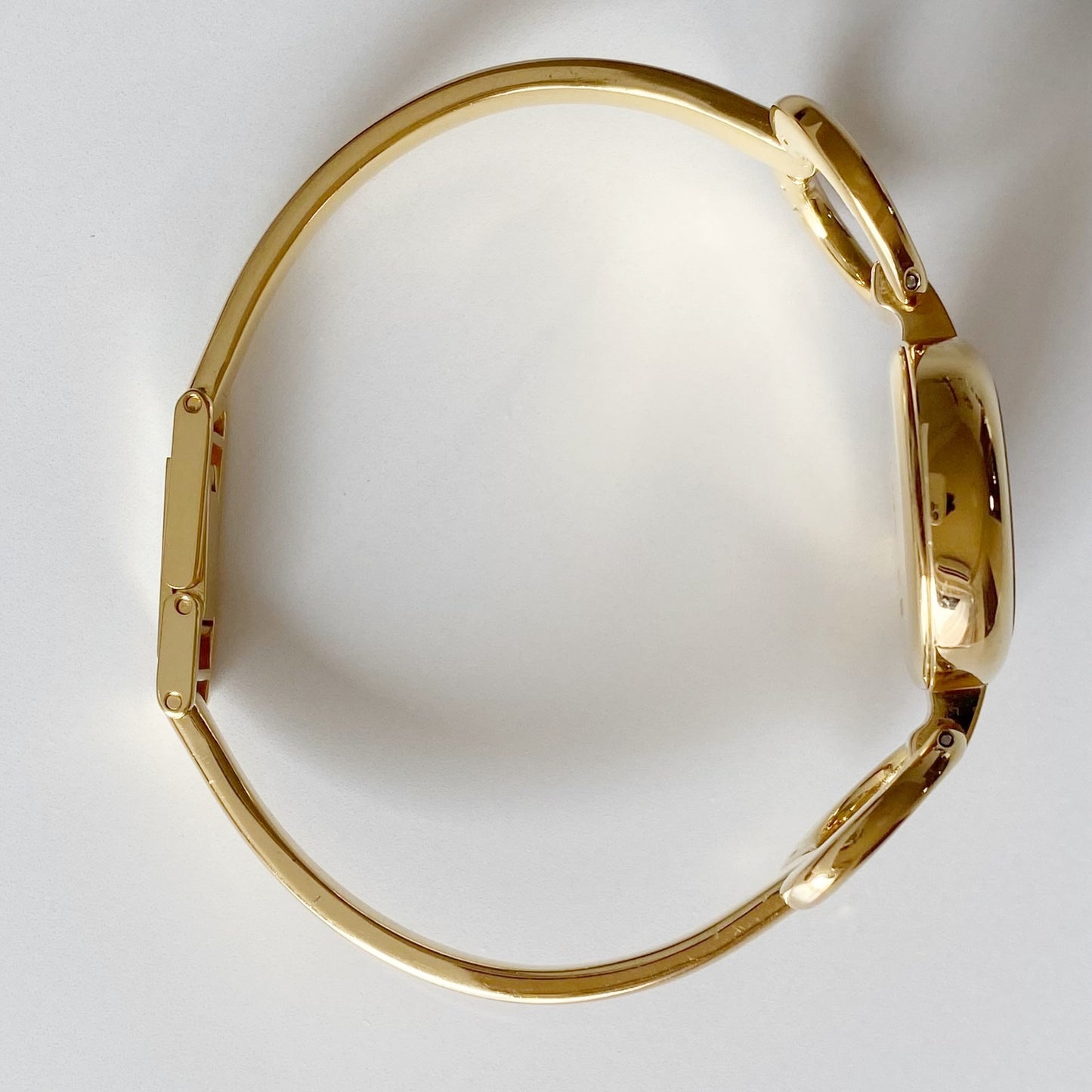 Gucci 1990s Black Dial Gold Plated Bangle Watch
