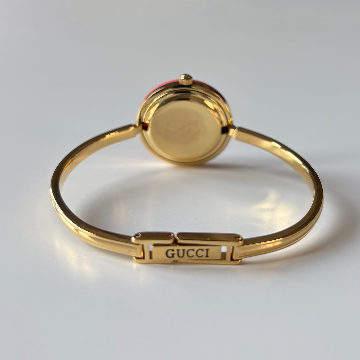 Gucci 1990s Interchangeable Bezel Gold Plated Bangle Watch with case, 12 bezels