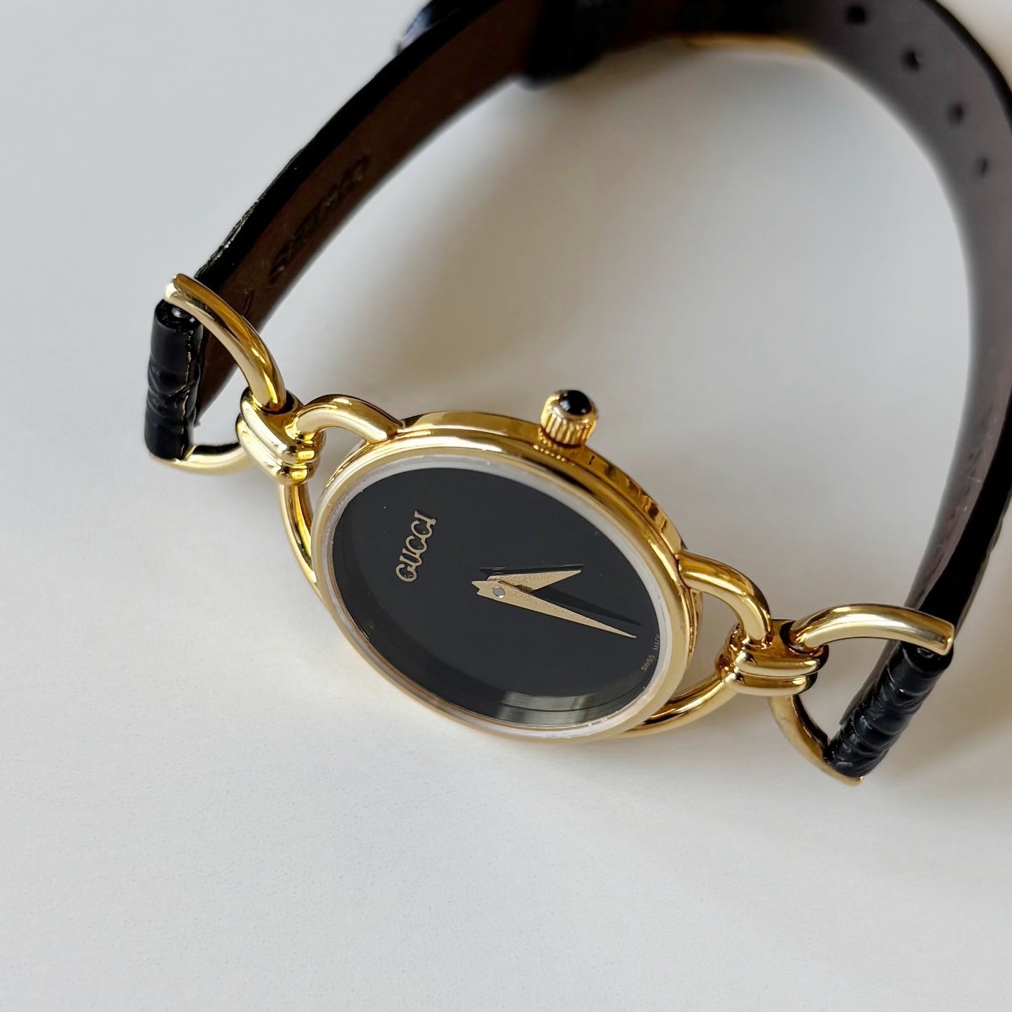 Gucci 1990s Black Round Dial Horsebit Gold Plated Watch