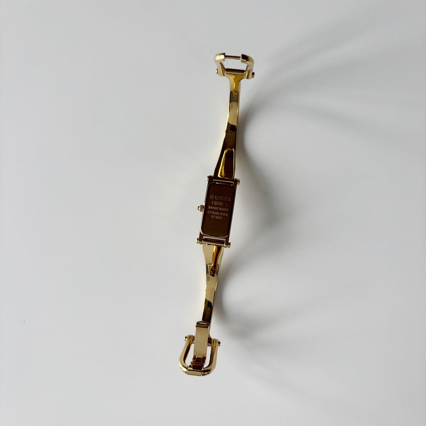 Gucci 1990s Gold Rectangular Dial Gold Plated Bangle Watch