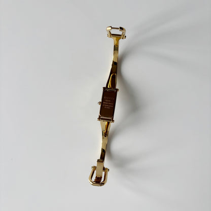 Gucci 1990s Gold Rectangular Dial Gold Plated Bangle Watch