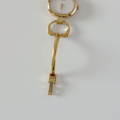 Gucci 1990s Seashell Oval Dial Gold-Plated Bangle Watch (Small)