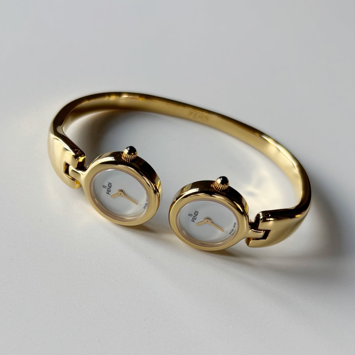 Fendi 1990s Seashell Dial Two Time Zone Gold Plated Bangle Watch