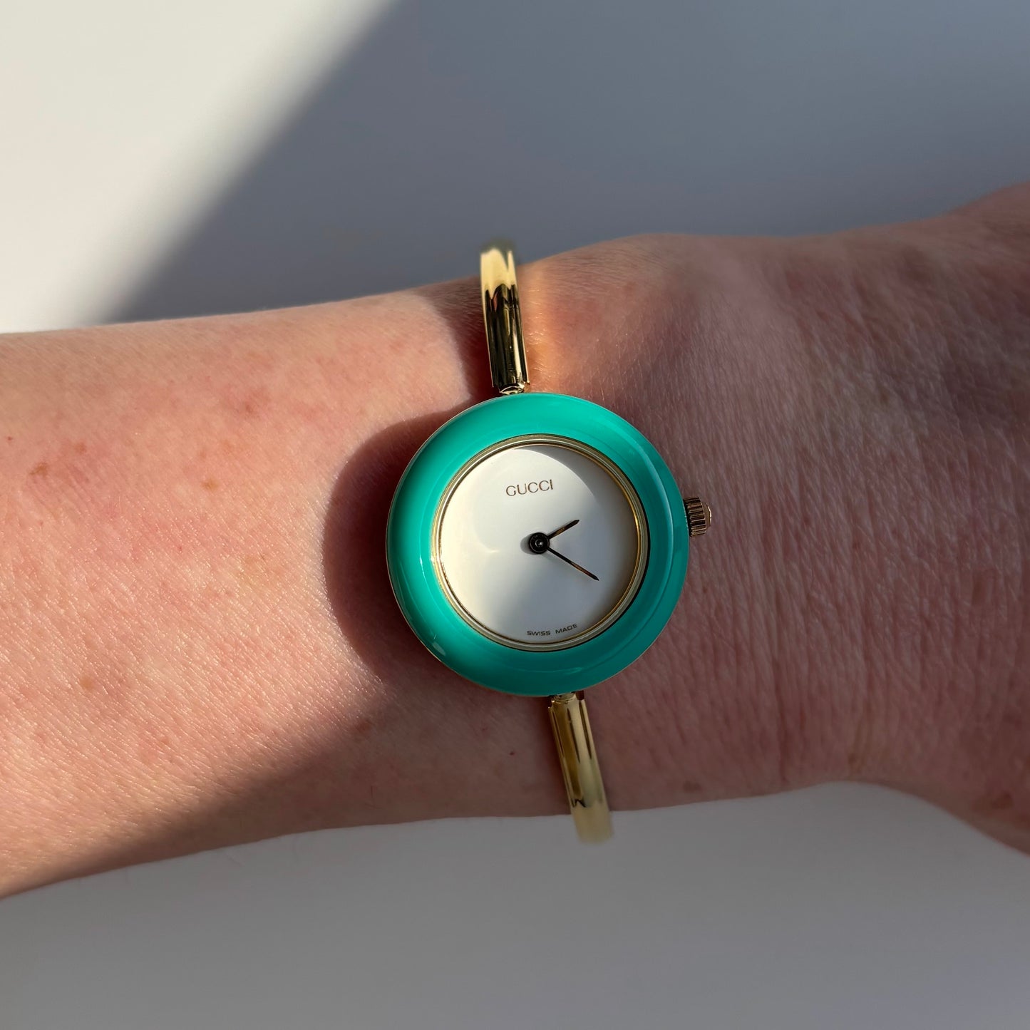 Gucci 1990s Interchangeable Bezel Gold Plated Bangle Watch with 12 bezels, case