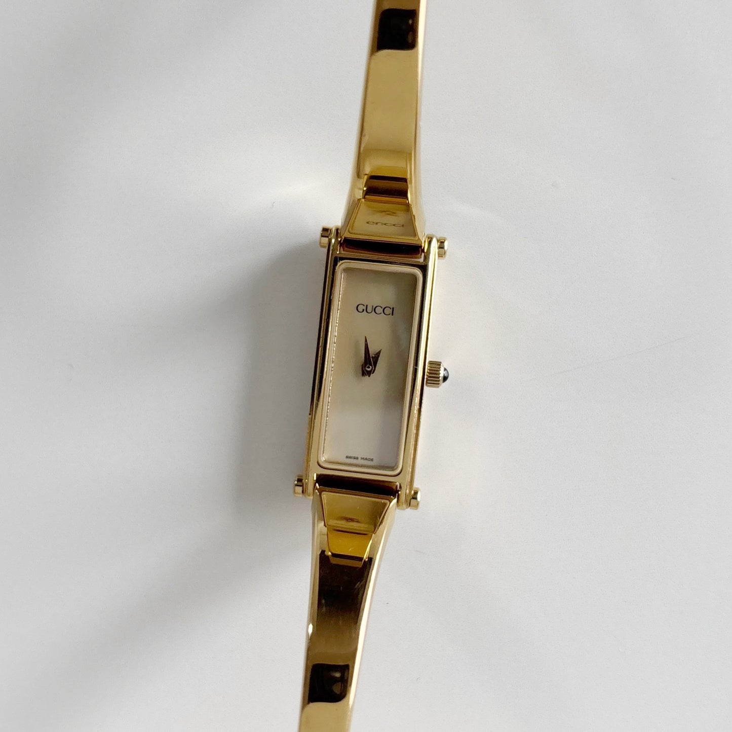 Gucci 1990s Rectangular Seashell Dial Gold Plated Bangle Watch