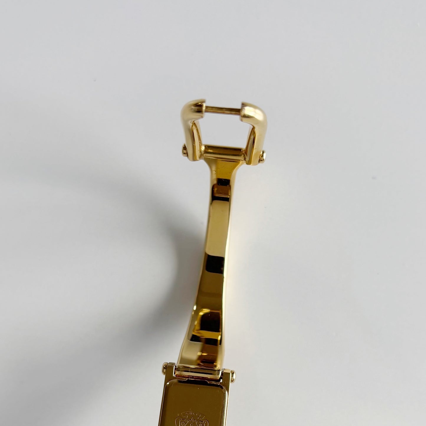 Gucci 1990s Gold Rectangular Dial Gold Plated Bangle Watch