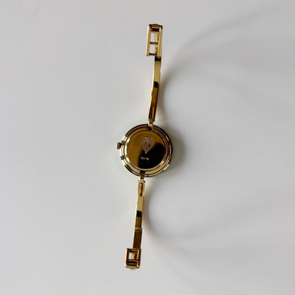 Gucci 1990s Interchangeable Bezel Gold Plated Bangle Watch with 12 bezels, case
