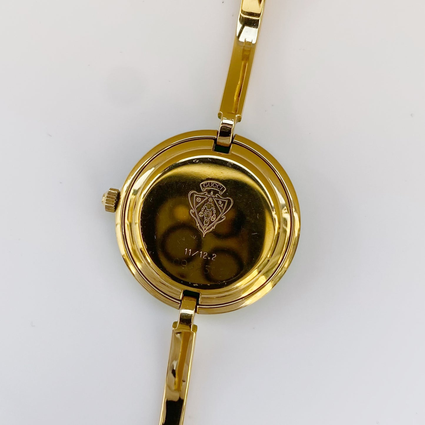 Gucci 1990s Interchangeable Bezel Gold Plated Bangle Watch with 12 bezels, Case