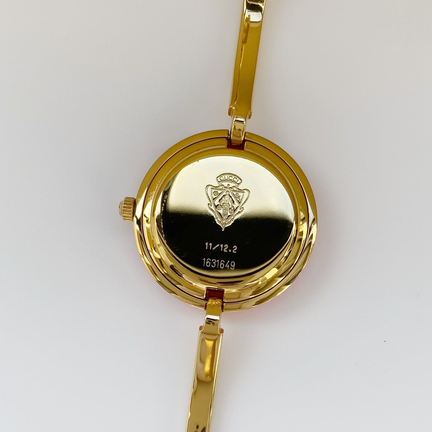 Gucci 1990s Interchangeable Bezel Gold Plated Bangle Watch with 12 bezels, case