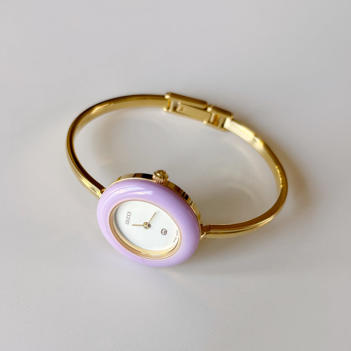 Gucci 1990s Interchangeable Bezel Gold Plated Bangle Watch with 12 bezels, case