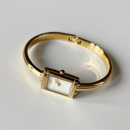 Yves Saint Laurent 1990s Seashell Dial Gold Plated Bangle Watch