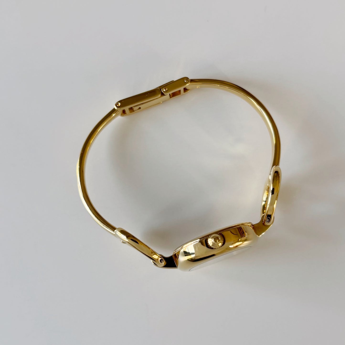 Gucci 1990s Oval Gold Dial Gold Plated Bangle Watch (Small)