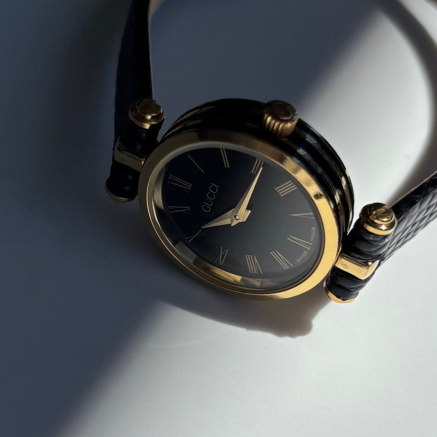 Gucci 1990s Black Round Dial Gold Plated Watch
