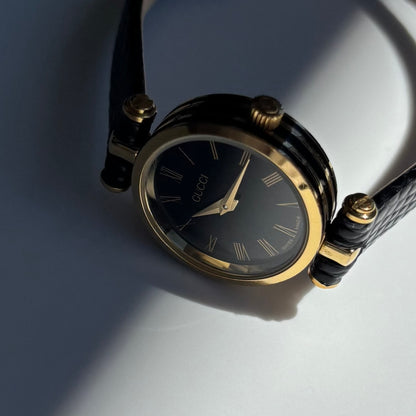 Gucci 1990s Black Round Dial Gold Plated Watch