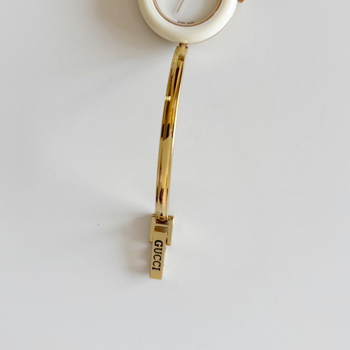 Gucci 1990s Interchangeable Bezel Gold Plated Bangle Watch with 12 bezels, case