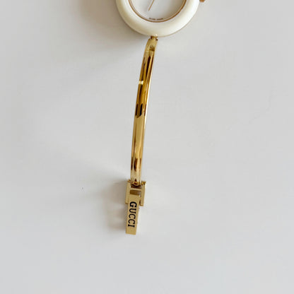 Gucci 1990s Interchangeable Bezel Gold Plated Bangle Watch with 12 bezels, case