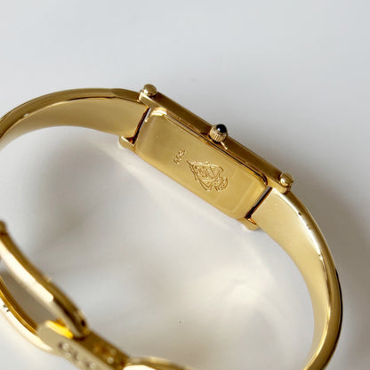 Gucci 1990s Rectangular Black Dial Gold Plated Bangle Watch