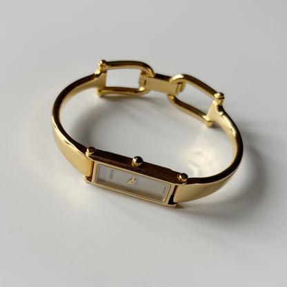 Gucci 1990s Seashell Dial Gold Plated Bangle Watch