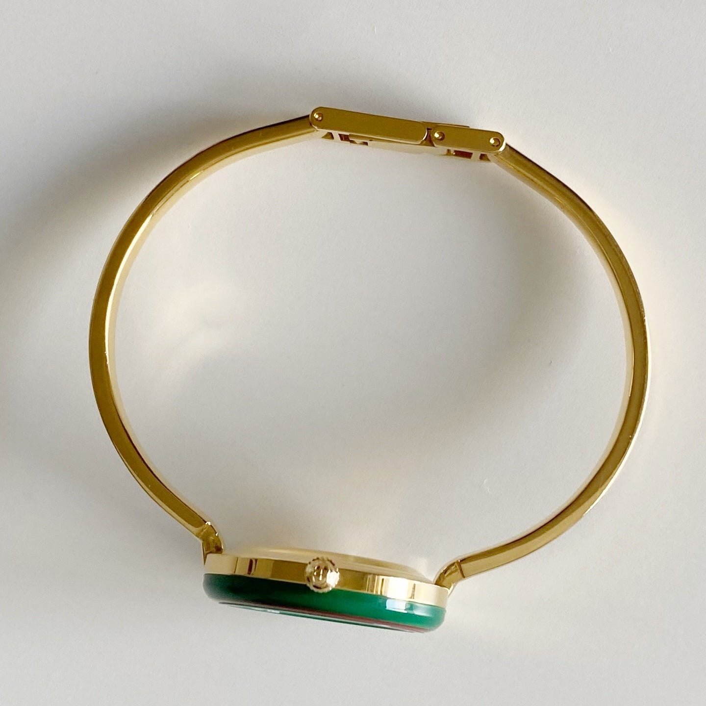 Gucci 1990s Interchangeable Bezel Gold Plated Bangle Watch with 12 bezels, case