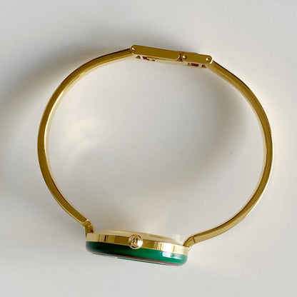 Gucci 1990s Interchangeable Bezel Gold Plated Bangle Watch with 12 bezels, case