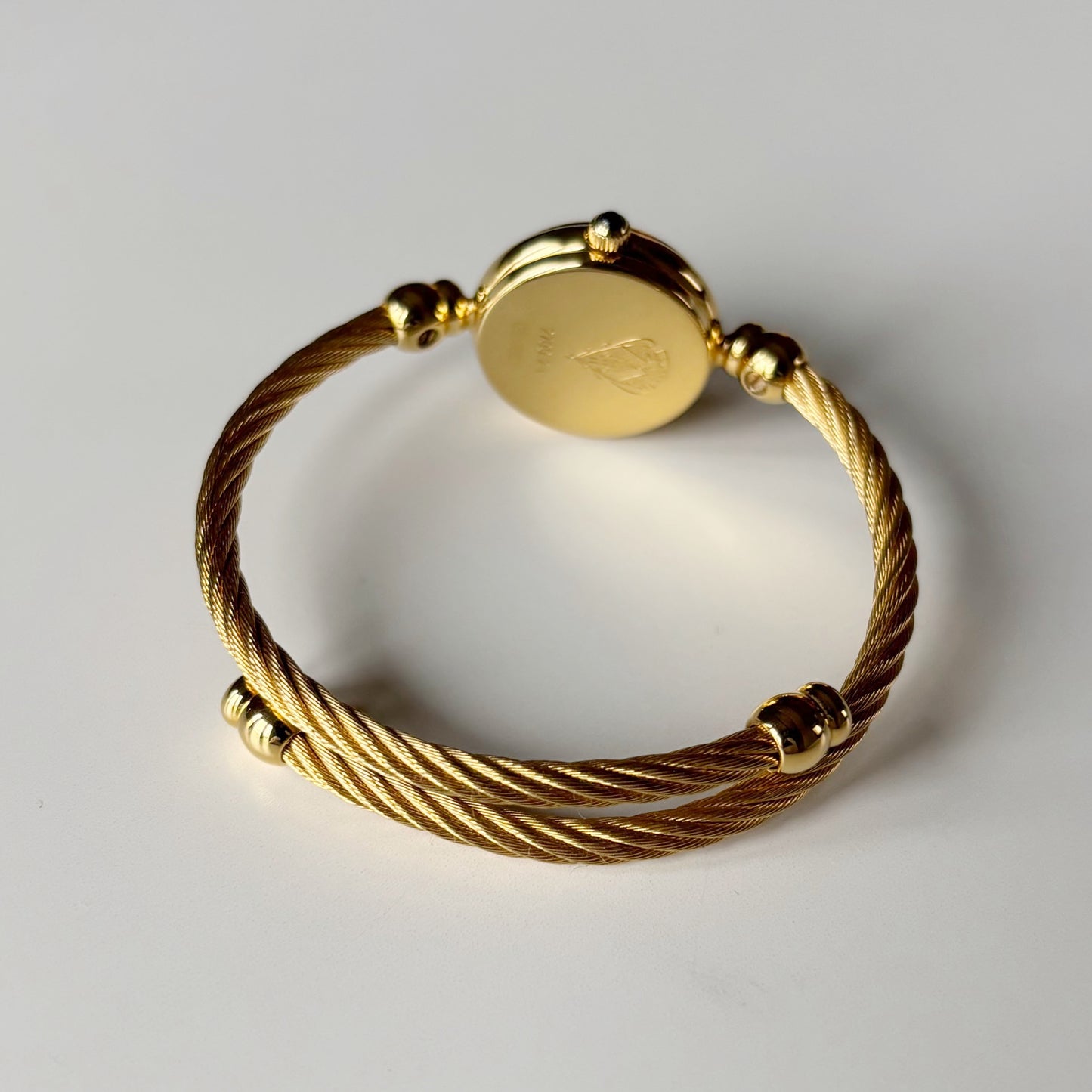 Gucci 1990s Black Dial Gold Plated Cable Bangle Watch