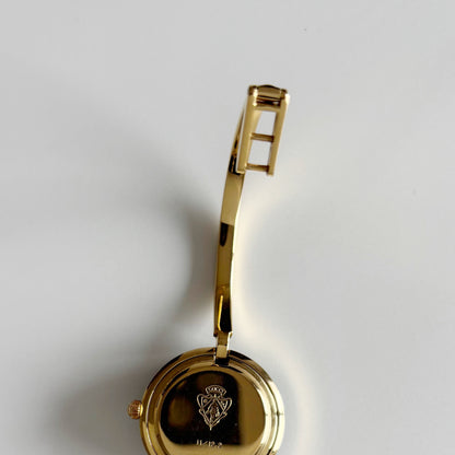 Gucci 1990s Interchangeable Bezel Gold Plated Bangle Watch with 12 bezels, case