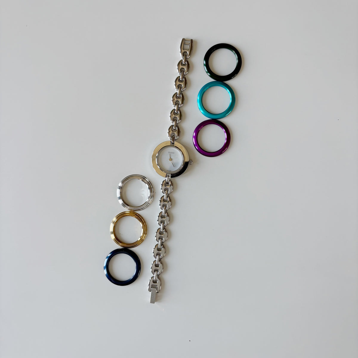 Gucci 1990s Interchangeable Bezel Stainless steel Chain Watch with 6 bezels, case