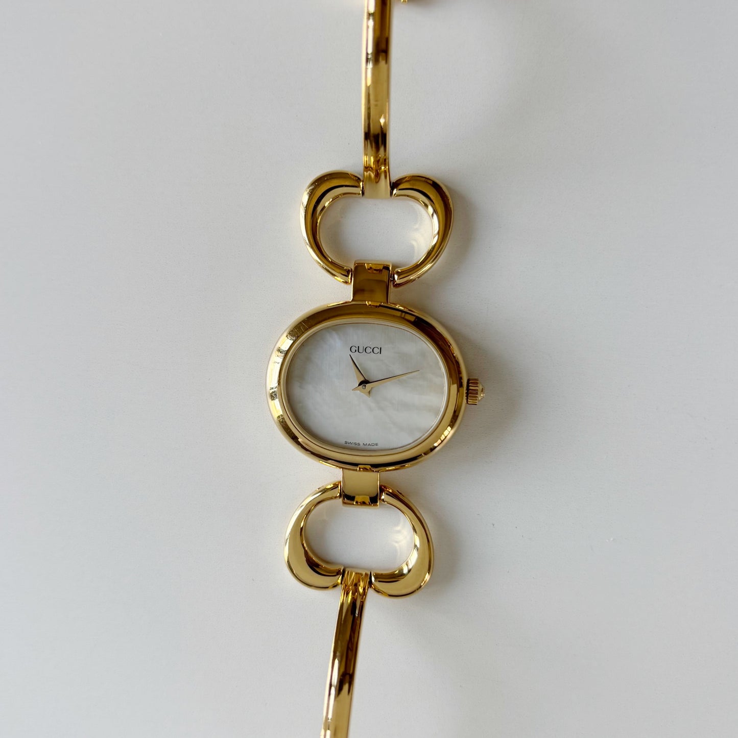Gucci 1990s Seashell Oval Dial Gold Plated Bangle Watch (Small)