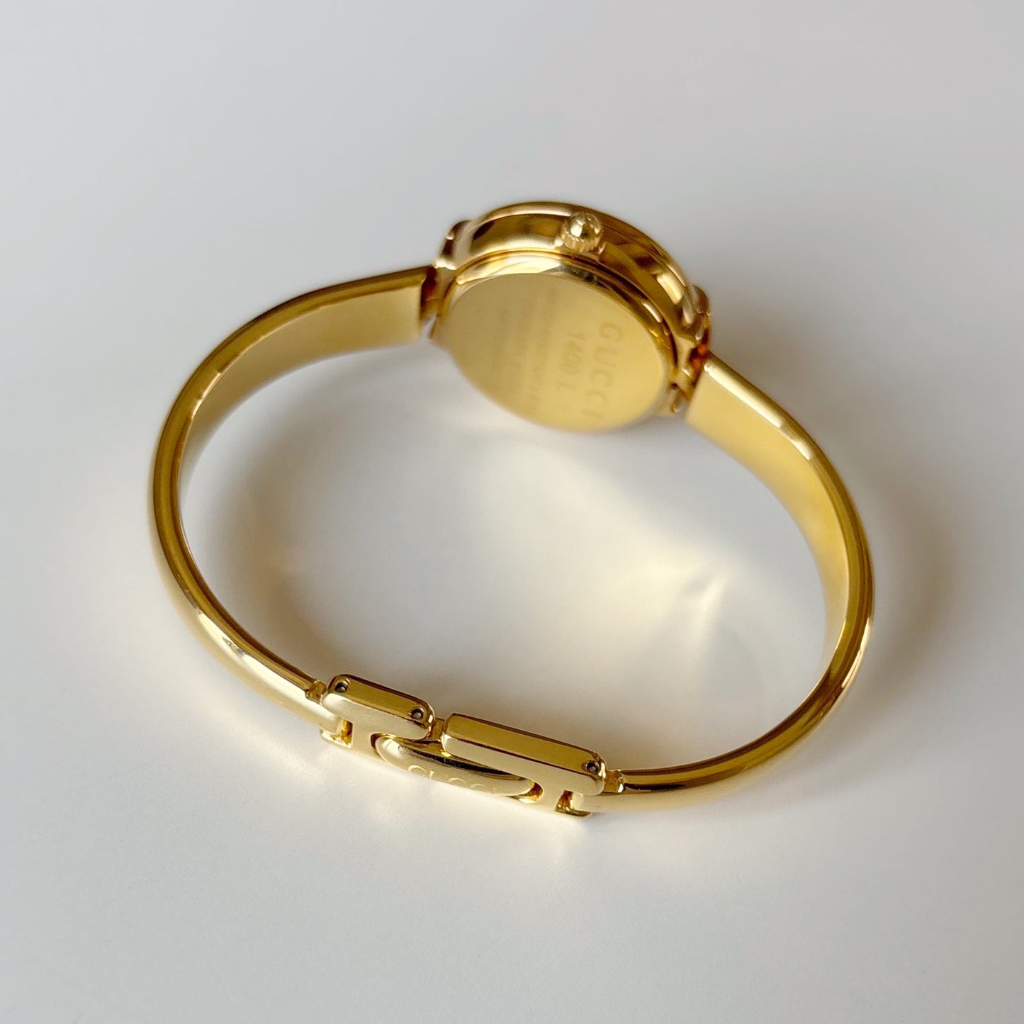 Gucci 1990s Round Dial Gold Plated Bangle Watch