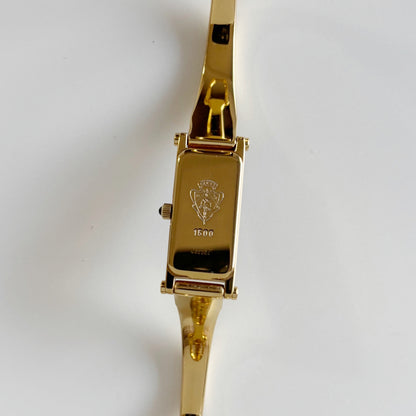 Gucci 1990s Black Dial Rectangular Gold Plated Bangle Watch