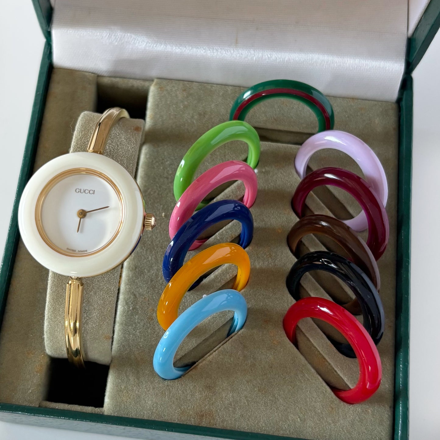 Gucci 1990s Interchangeable Bezel Gold Plated Bangle Watch with 12 bezels, case
