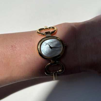 Gucci 1990s Seashell Oval Dial Gold Plated Bangle Watch (Small)