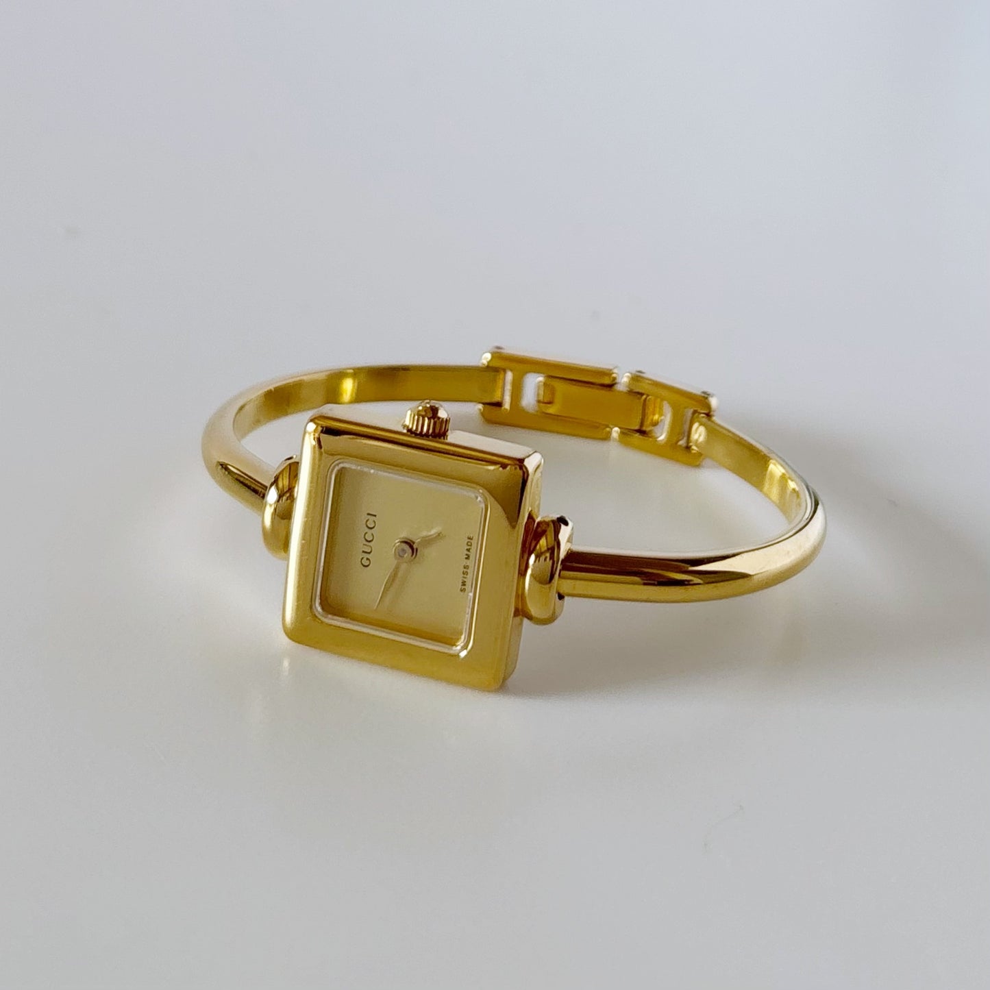 Gucci 1990s Square Dial Gold Plated Bangle Watch (Small)