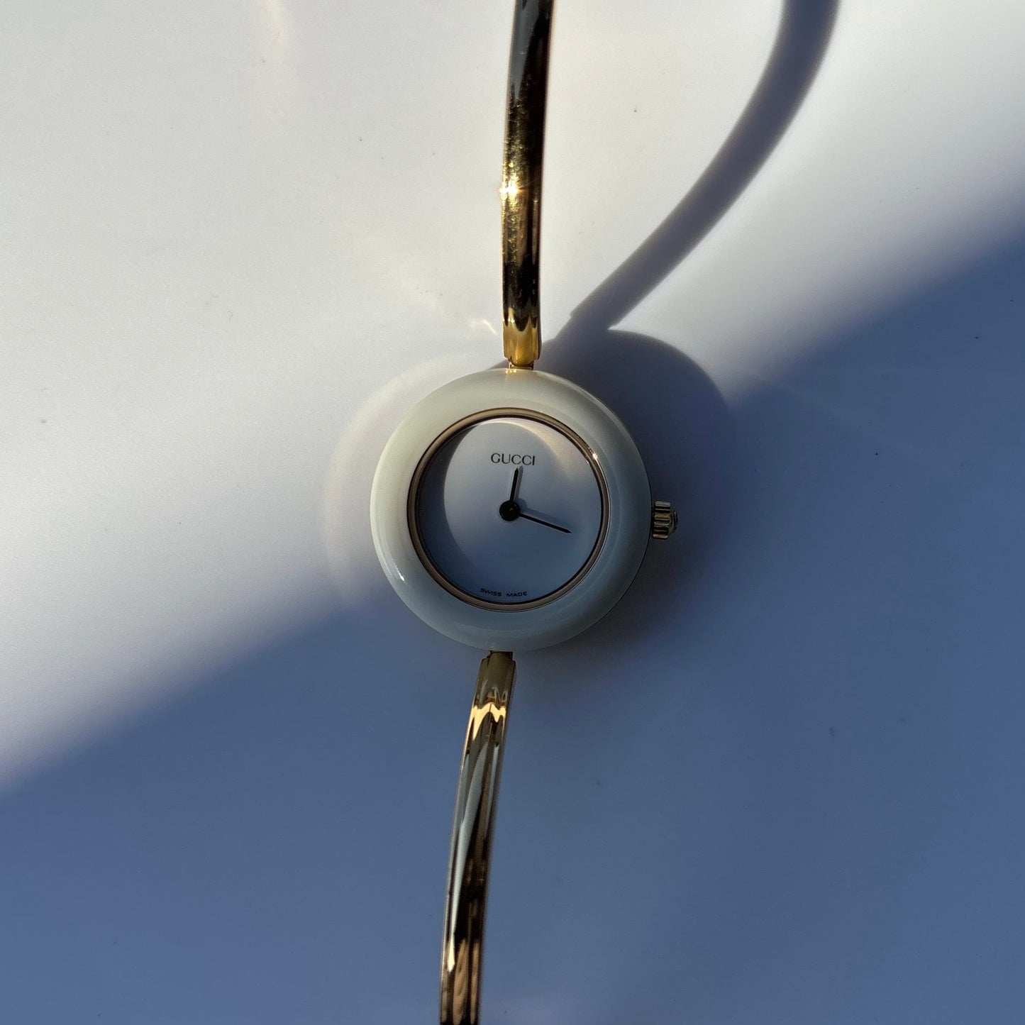 Gucci 1990s Interchangeable Bezel Gold Plated Bangle Watch with 12 bezels, case (Small)