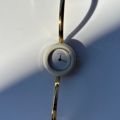 Gucci 1990s Interchangeable Bezel Gold Plated Bangle Watch with 12 bezels, case (Small)