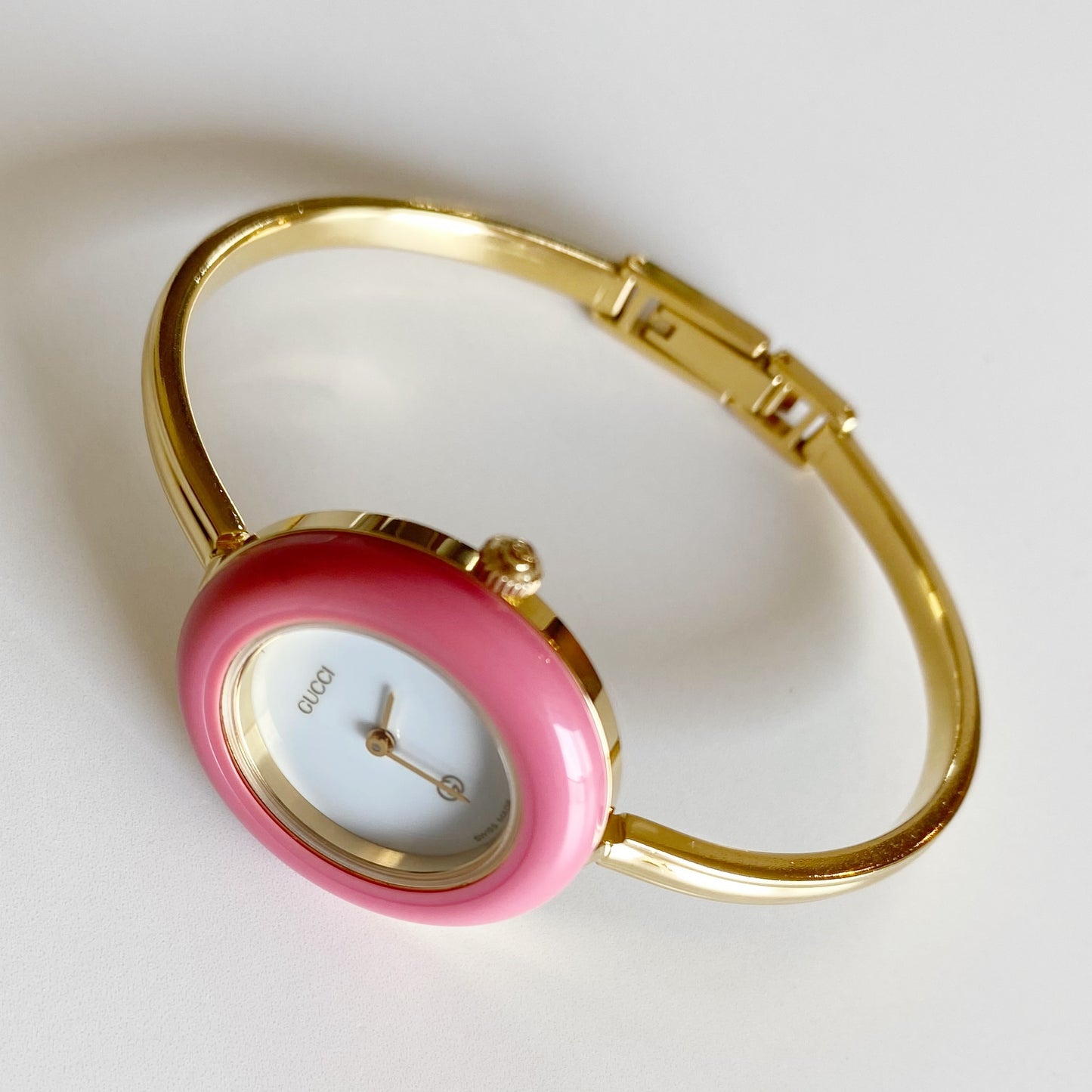 Gucci 1990s Interchangeable Bezel Gold Plated Bangle Watch with 12 bezels, case