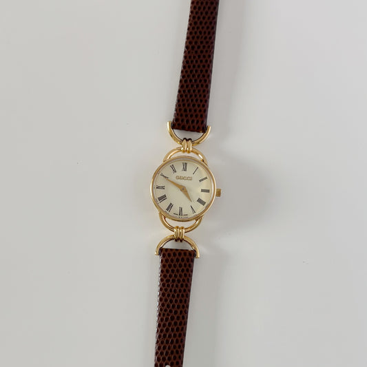 Gucci 1990s Round Dial Horsebit Gold Plated Watch