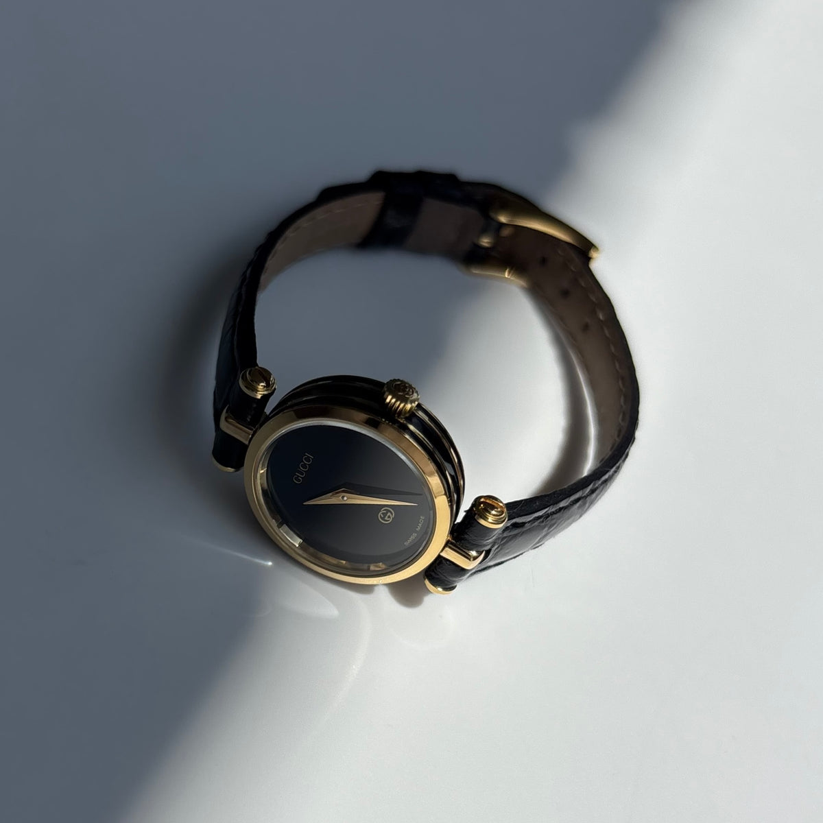 Gucci 1980s Black Dial Round Gold-Plated Watch