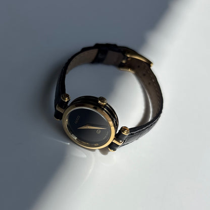 Gucci 1980s Black Dial Round Gold-Plated Watch