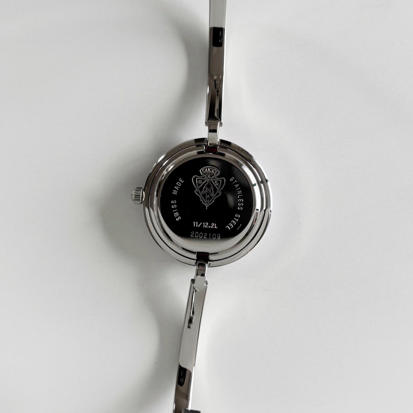 Gucci 1990s Interchangeable Bezel Stainless Steel Bangle Watch with 12 bezels, case