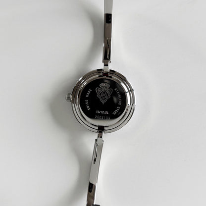 Gucci 1990s Interchangeable Bezel Stainless Steel Bangle Watch with 12 bezels, case
