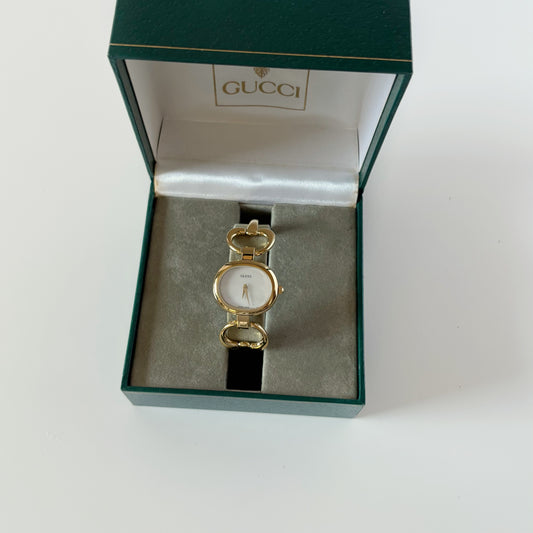 Gucci 1990s Seashell Oval Dial Gold-Plated Bangle Watch (Small)