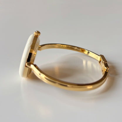 Gucci 1990s Interchangeable Bezel Gold Plated Bangle Watch with case, 12 bezels (Small)